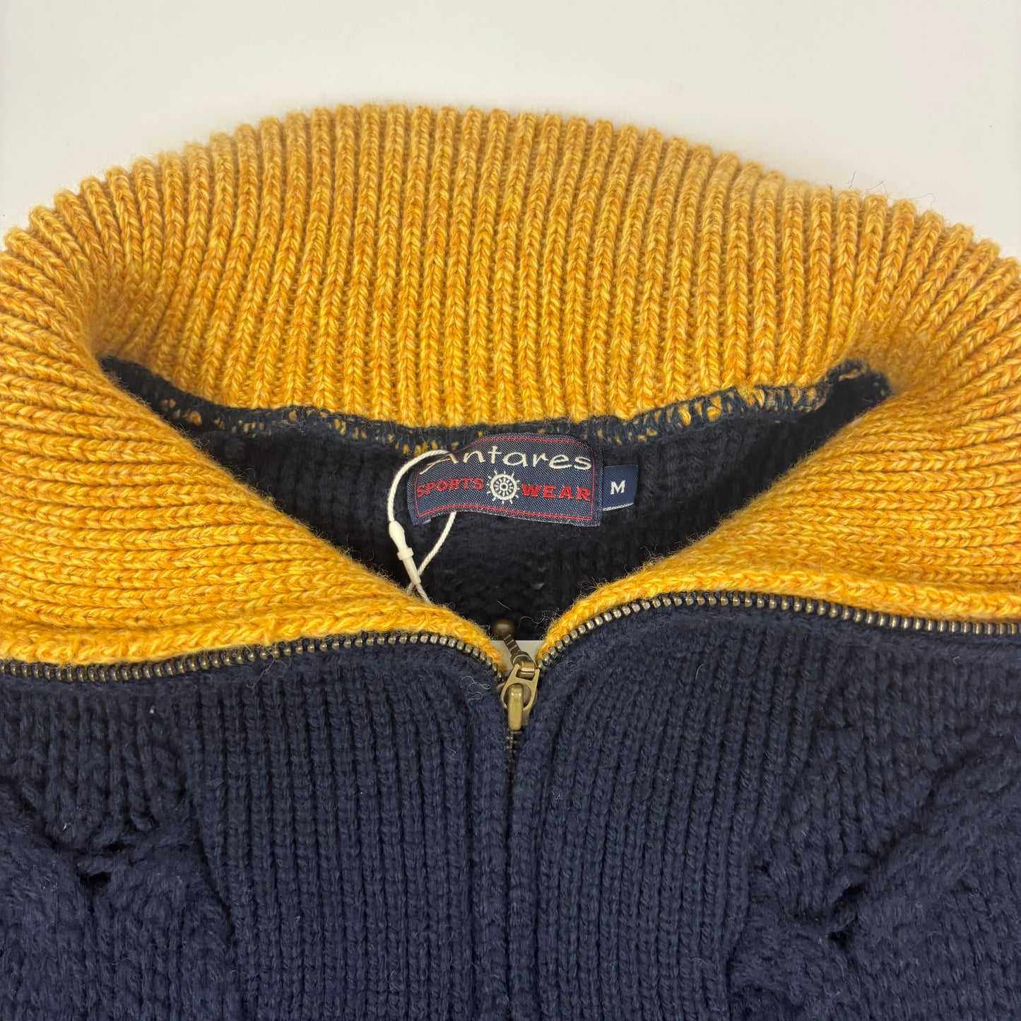 Cable Knit High Neck Jumper